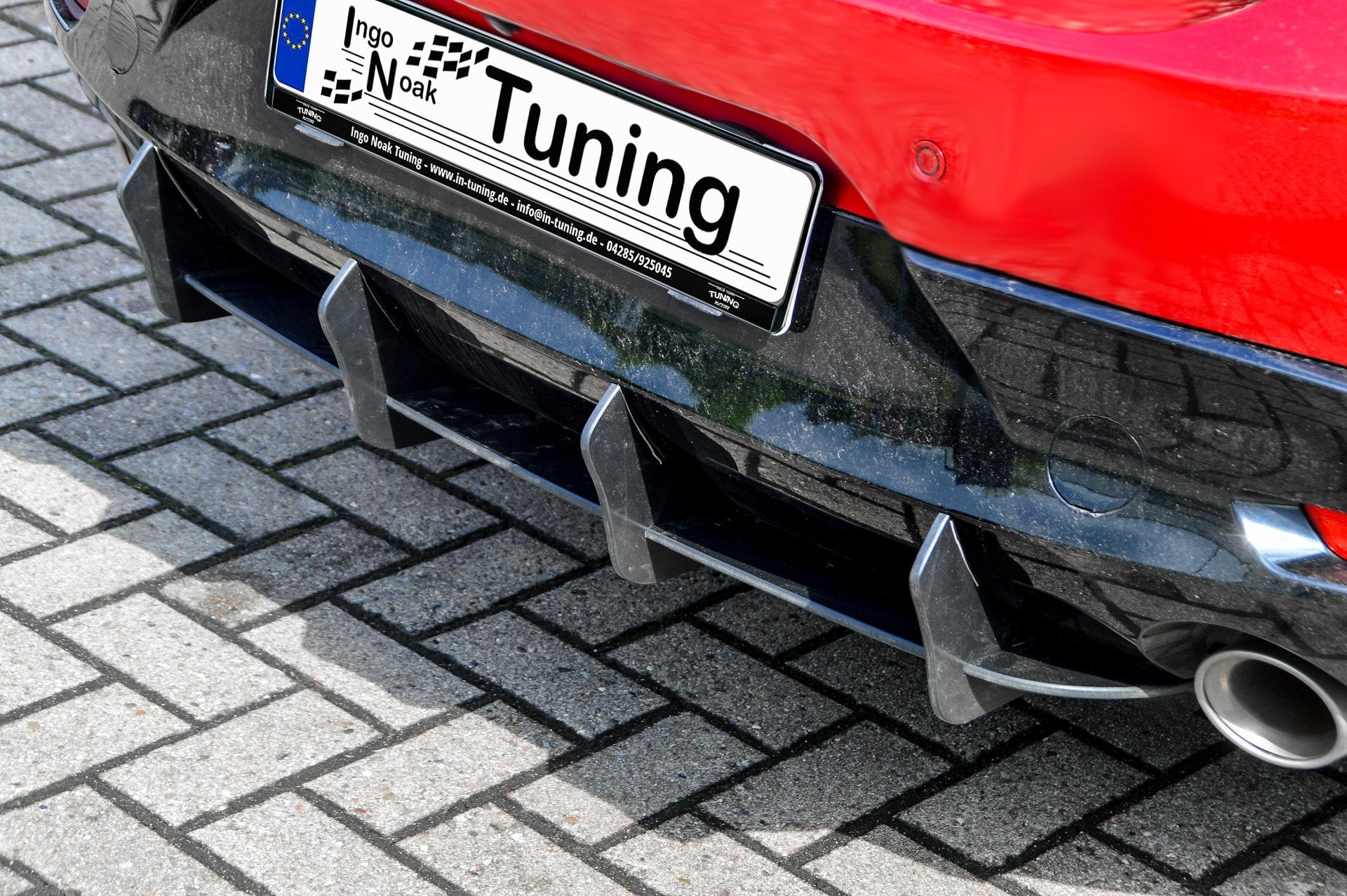 Gefräster Heckansatz aus ABS für Mazda 3 BP, in schwarz, von Ingo Noak Tuning, zeigt das aerodynamische Fahrzeug-Upgrade