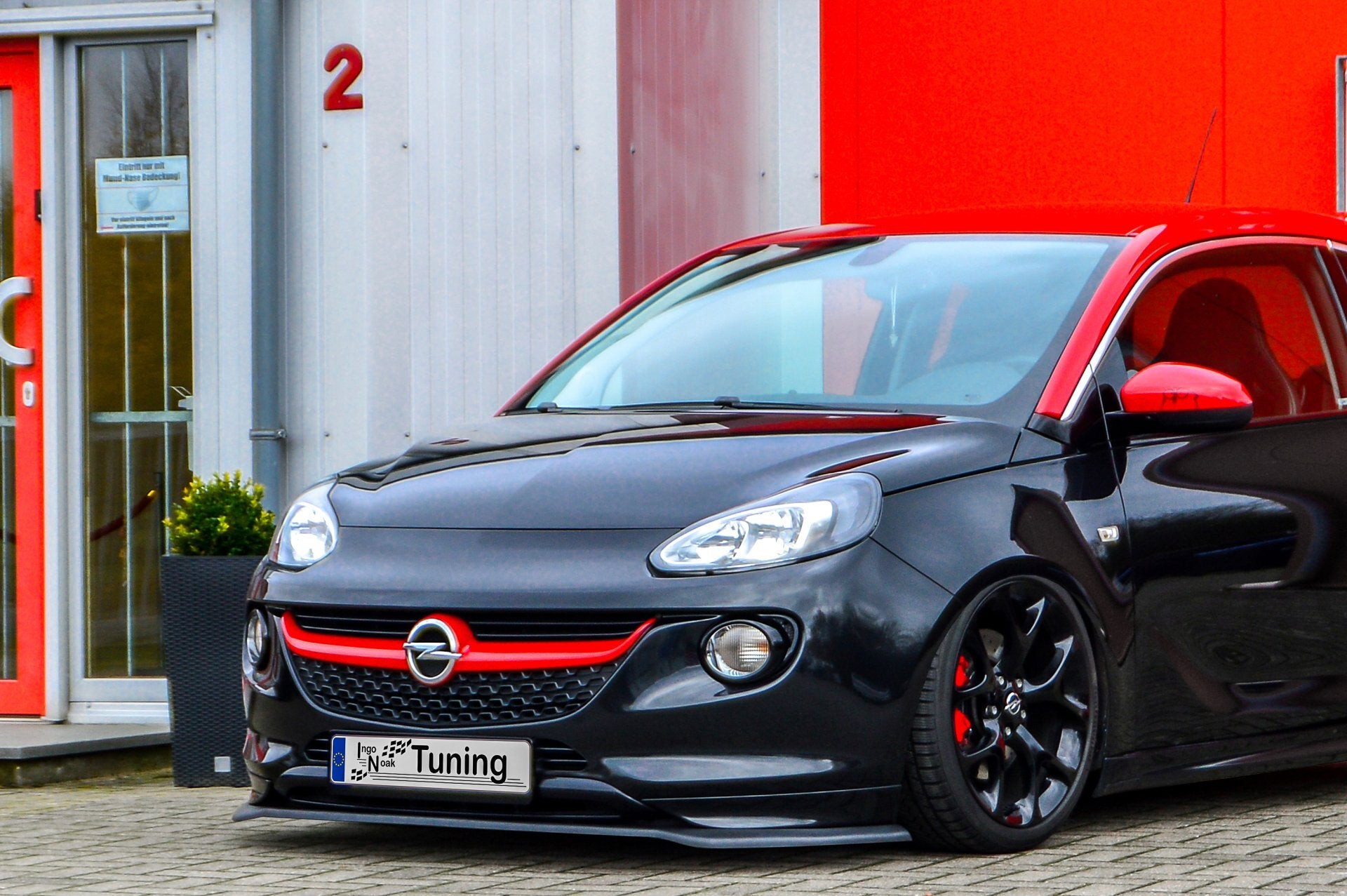 Opel Adam S Frontspoilerlippe von Ingo Noak Tuning, passend für Modelle ab 2015, aus hochwertigem Material.