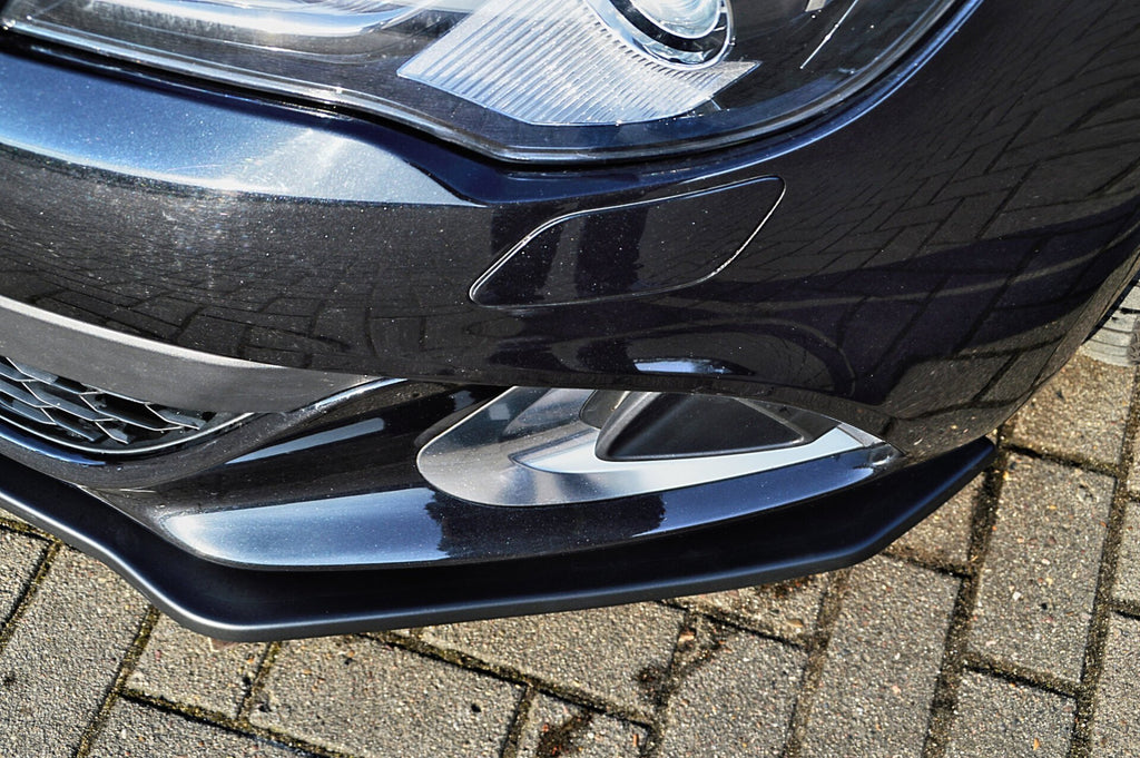 Cup Spoilerlippe für Opel Astra J OPC, schwarzes Tuning-Teil von Ingo Noak Tuning, auf Fahrzeug montiert sichtbar