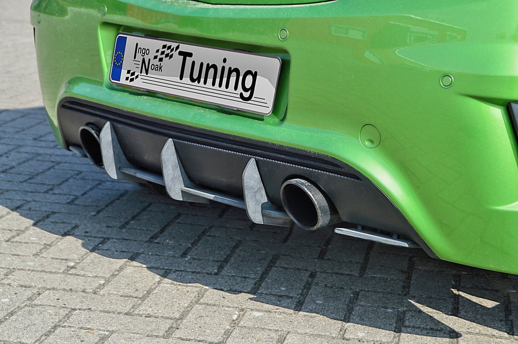 Heckansatz für Opel Corsa D OPC Nürburgring Edition von Ingo Noak Tuning, aus schwarz lackiertem Kunststoff gefertigt.