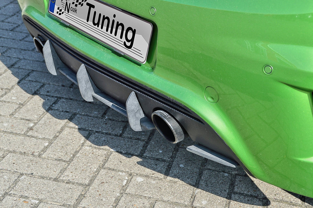 Heckansatz für Opel Corsa D OPC Nürburgring Edition, Ingo Noak Tuning, aus schwarzem Kunststoff, sichtbare Befestigungspunkte.