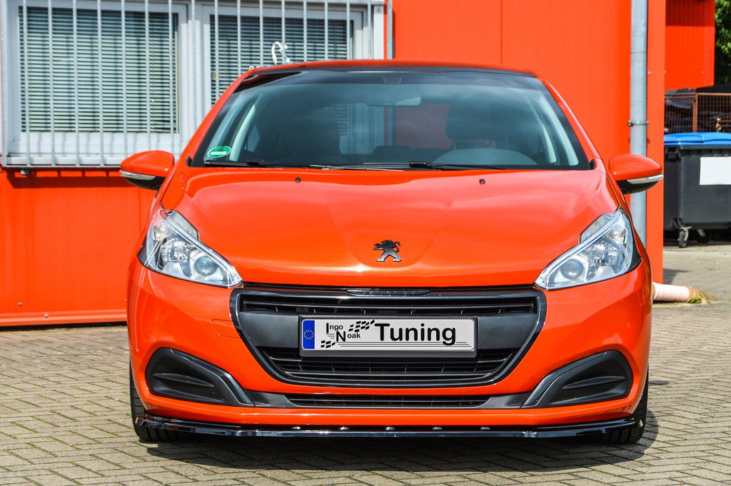 Schwarz lackierte Cuplippe Frontspoilerlippe für Peugeot 208 Facelift von Ingo Noak Tuning, zeigt die aerodynamische Fahrzeugfront
