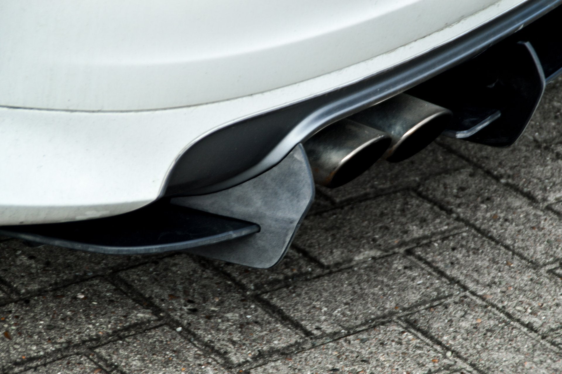 Gefräster Heckansatz für Audi S3 8P von Ingo Noak Tuning, aus hochwertigem Material, zeigt das detaillierte Design und Passform.