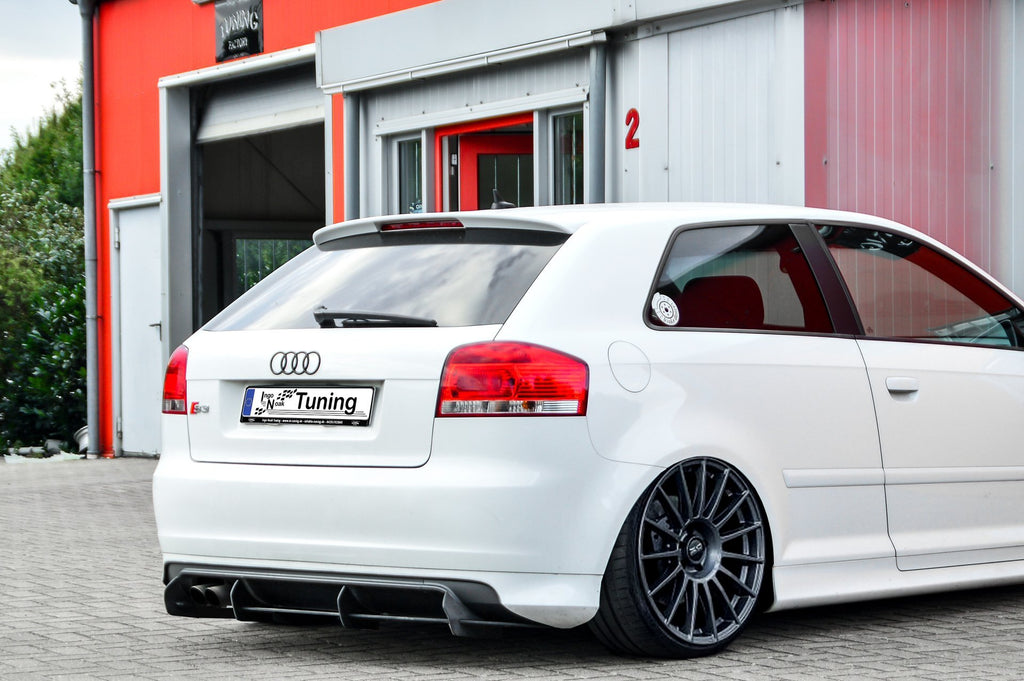 Gefräster Heckansatz für Audi S3 8P von Ingo Noak Tuning, zeigt detaillierte Bearbeitung und sportliches Design.