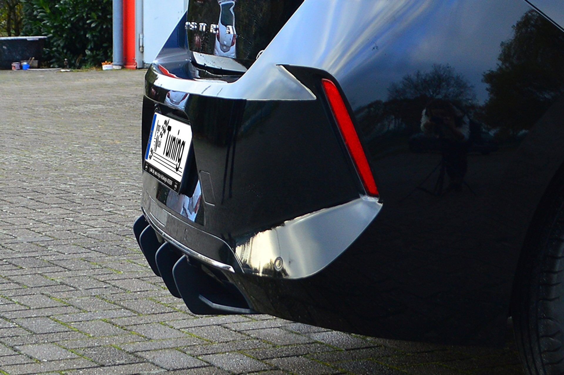 Gefräster Heckansatz mit Finnen für Opel Astra L