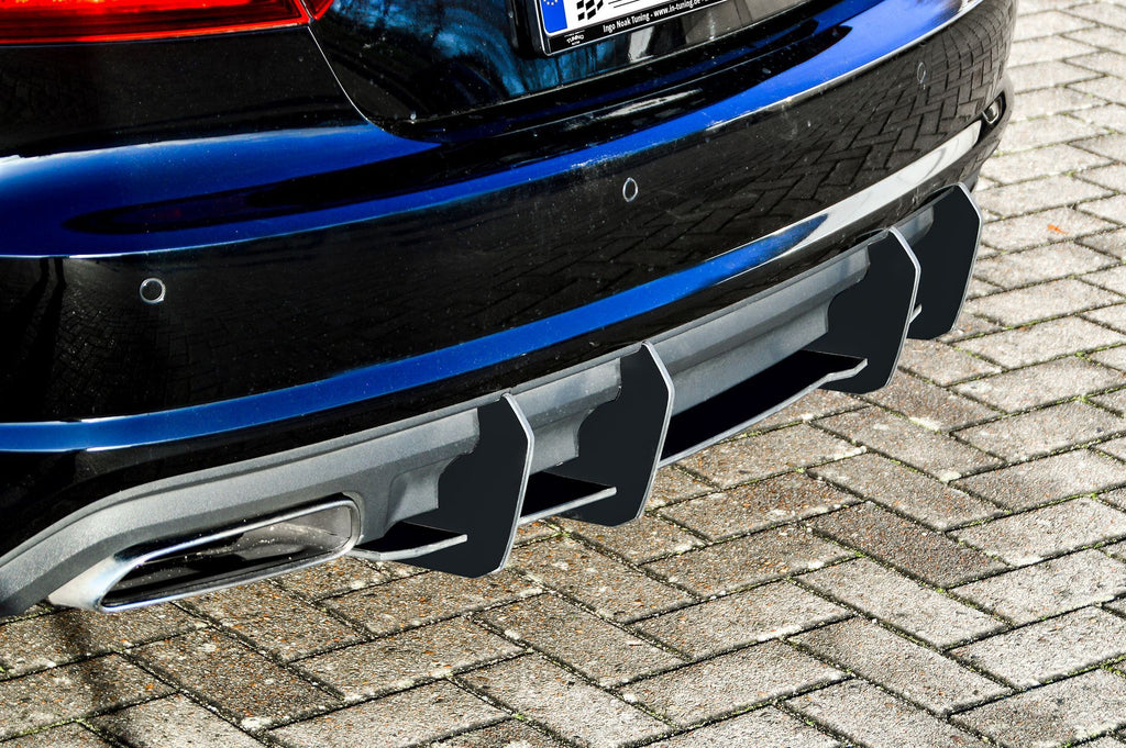 Gefräster ABS-Heckansatz für Audi A7 C7 4G von Ingo Noak Tuning, sichtbar auf dem Fahrzeug montiert.