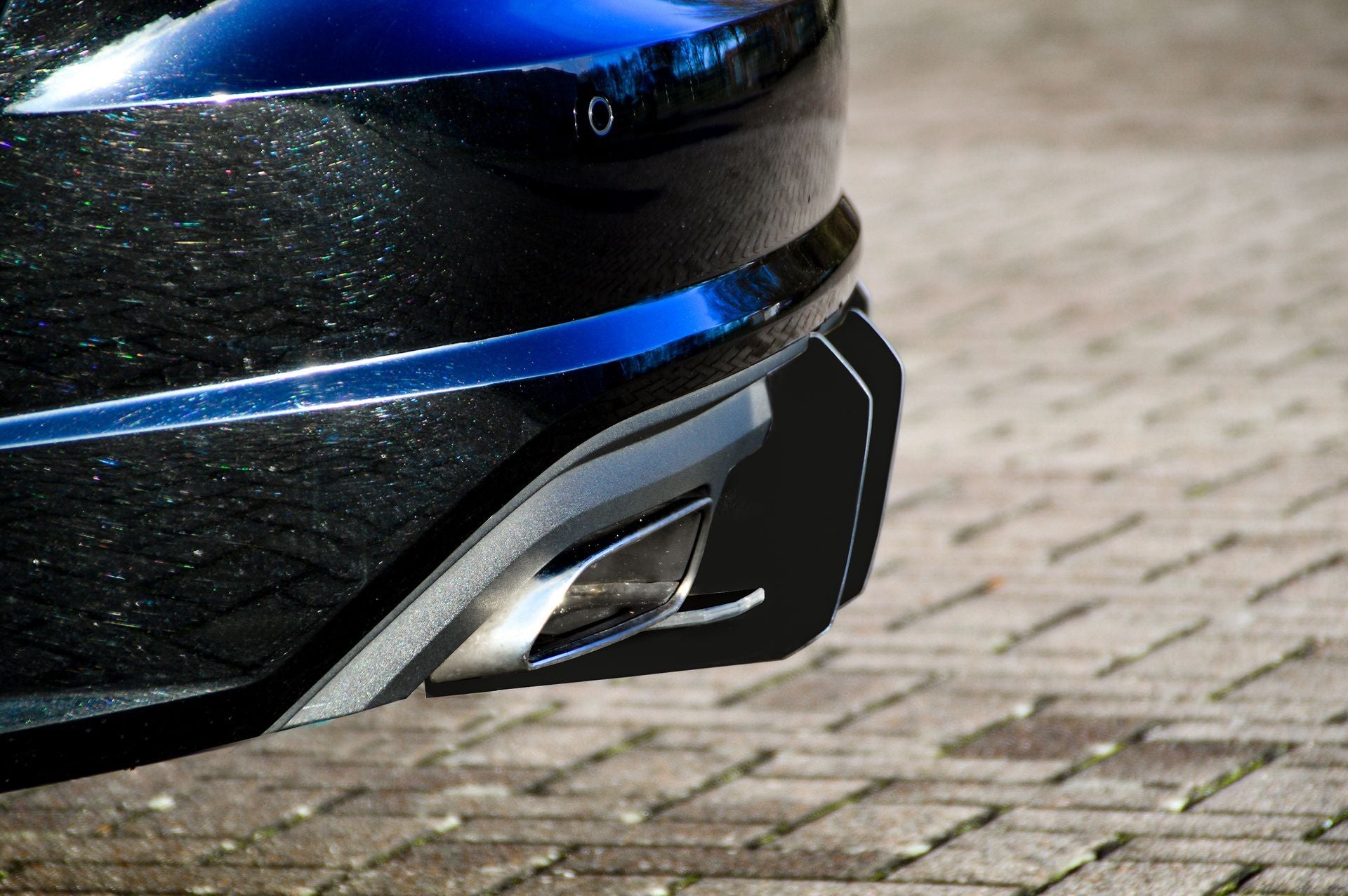 Gefräster ABS-Heckansatz für Audi A7 C7 4G, Ingo Noak Tuning, zeigt das aerodynamische Design des Heckabschlusses.
