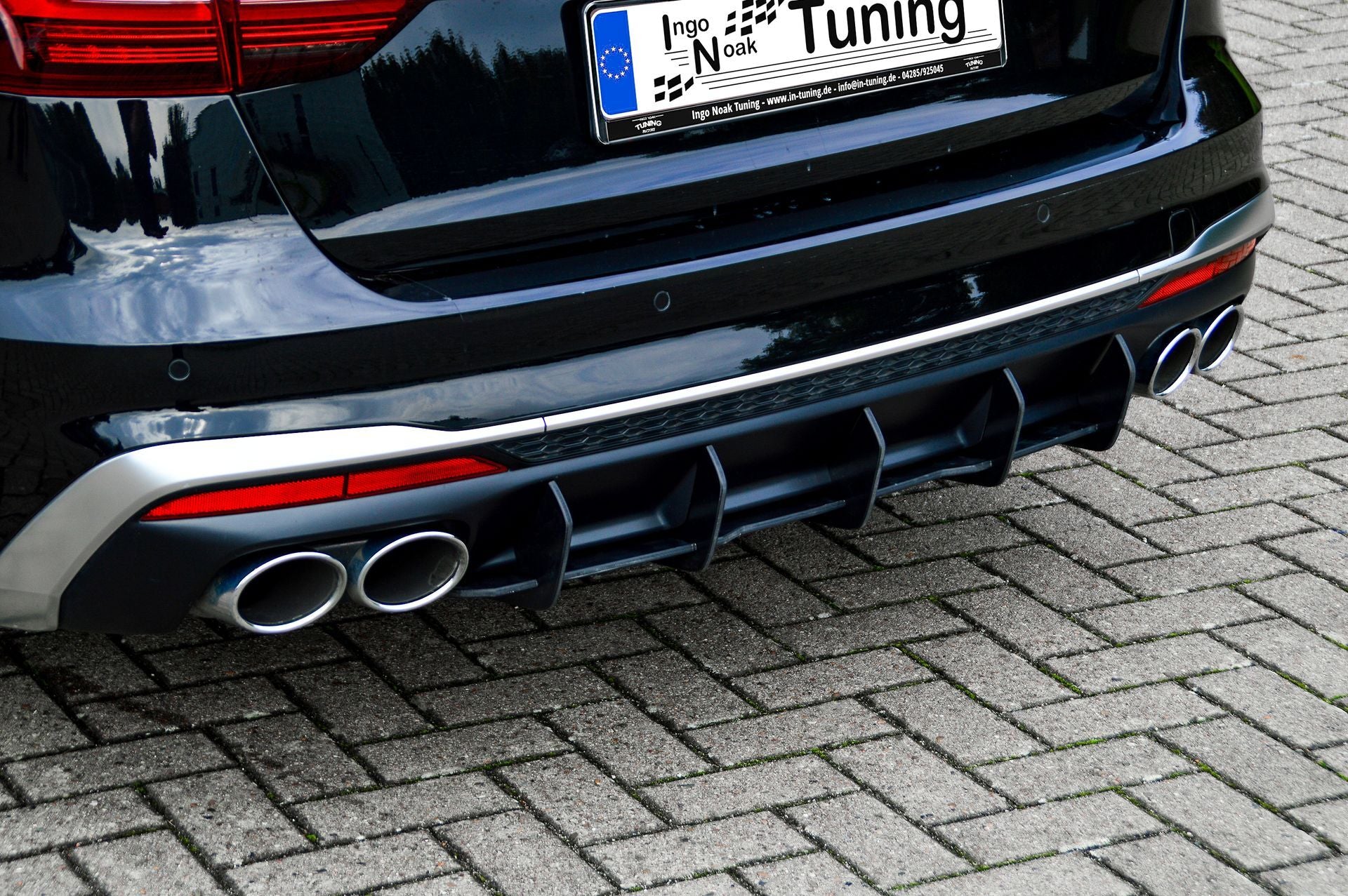 Gefräster Heckansatz aus ABS für Audi S4 B9 Facelift, schwarzes Tuning-Teil von Ingo Noak Tuning, sichtbar auf Auto.