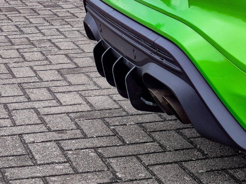 Heckansatz Diffusor für Ford Puma ST von Ingo Noak Tuning, aus schwarzem Kunststoff mit aerodynamischem Design.
