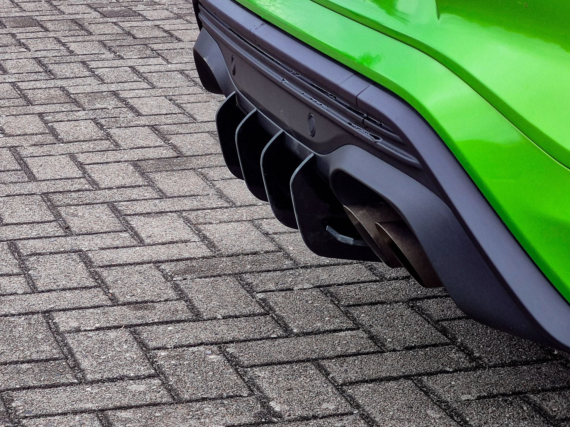 Heckansatz Diffusor für Ford Puma ST von Ingo Noak Tuning, aus schwarzem Kunststoff mit aerodynamischem Design.
